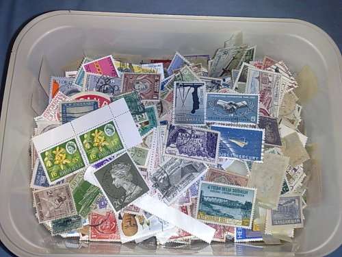 WORLWIDE ASS. IN ALMOST FULL ICE CREAM TUB-MANY HUNDREDS, GOOD STAMPS IN HERE,SURE TO BE FINDS