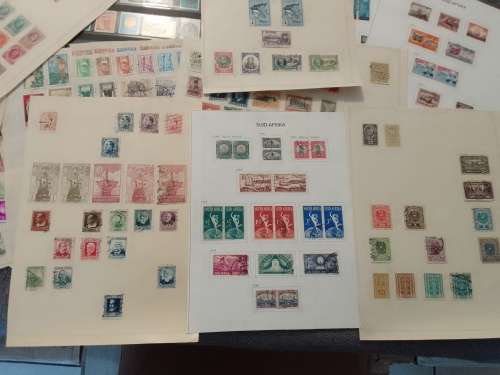 WORLD ASSORTED ON 30 PAGES-BID PER PAGE-MOSTLY FINE,NOT CHECKED-A FEW PAGES FREE!!