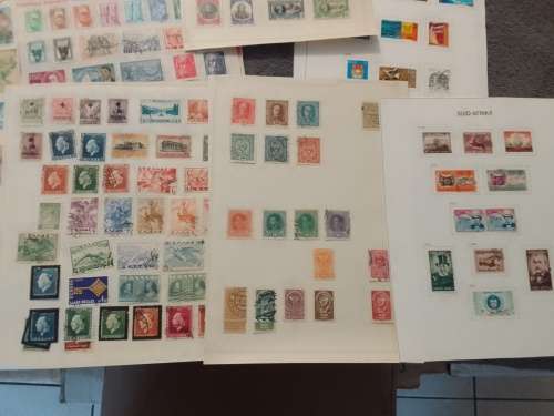 WORLD ASSORTED ON 30 PAGES-BID PER PAGE-MOSTLY FINE,NOT CHECKED-A FEW PAGES FREE!!