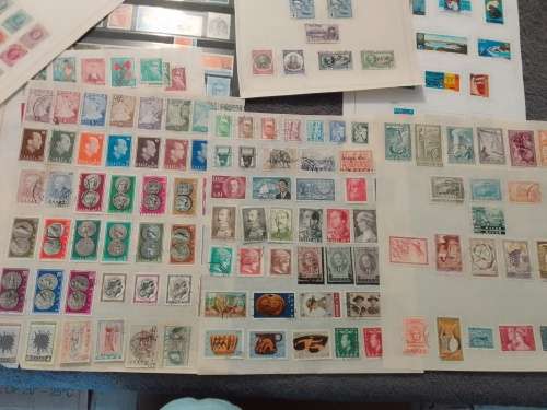 WORLD ASSORTED ON 30 PAGES-BID PER PAGE-MOSTLY FINE,NOT CHECKED-A FEW PAGES FREE!!