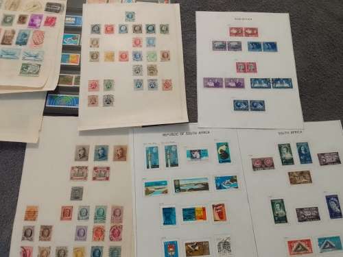 WORLD ASSORTED ON 30 PAGES-BID PER PAGE-MOSTLY FINE,NOT CHECKED-A FEW PAGES FREE!!