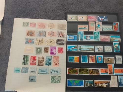 WORLD ASSORTED ON 30 PAGES-BID PER PAGE-MOSTLY FINE,NOT CHECKED-A FEW PAGES FREE!!