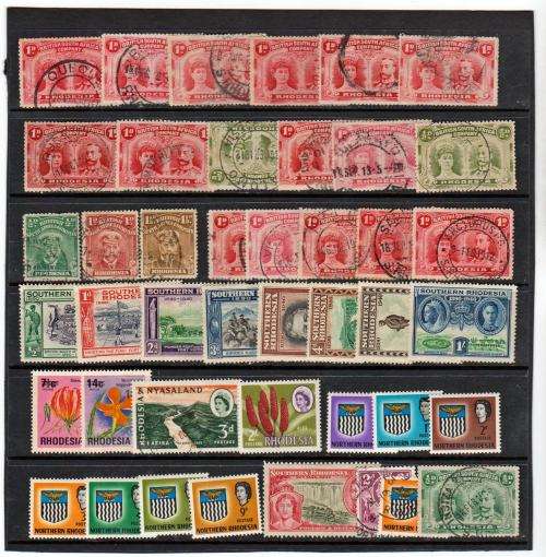 BSAC &RHODESIA-ASSORTED USED AND MINT ON CARD-SOME BETTER POSTMARKS ON DOUBLE HEADS-
