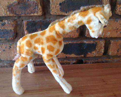Vintage straw stuffed giraffe