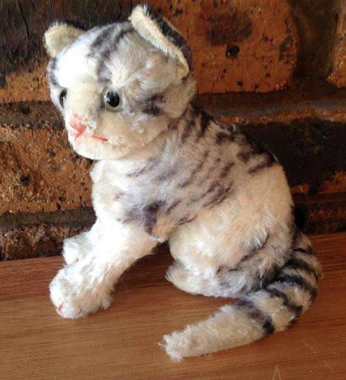 Vintage straw stuffed cat