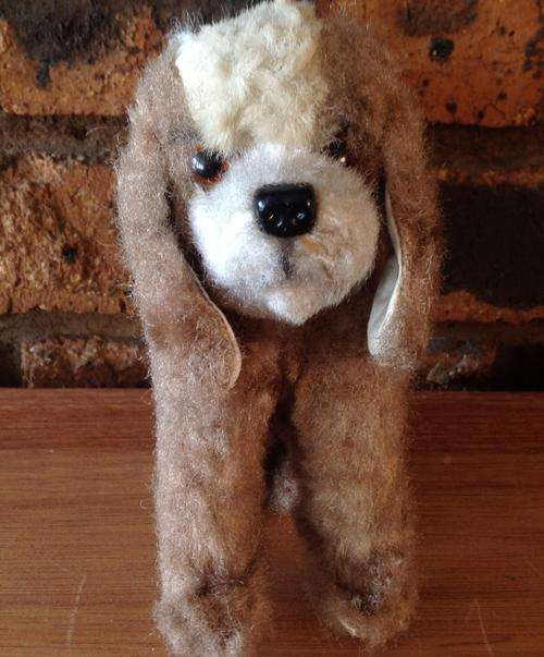 Vintage straw stuffed dog
