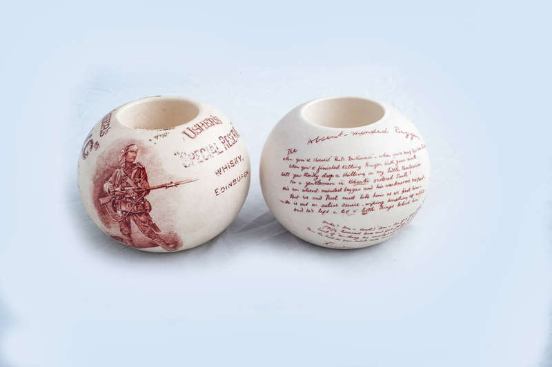 ***2 x miniature porcelain candle holders with an image of "A Gentleman In Khaki"***