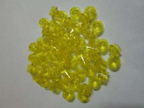 Transparent Yellow 1x1 round plate - LEGO Accessories & Parts