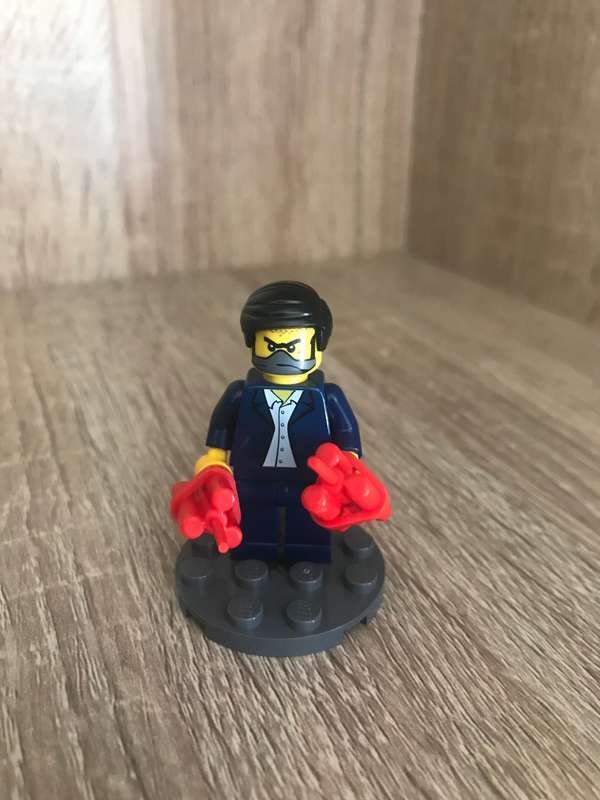 Bandit 001 with stand and dynamite sticks - Lego Western Minifigure