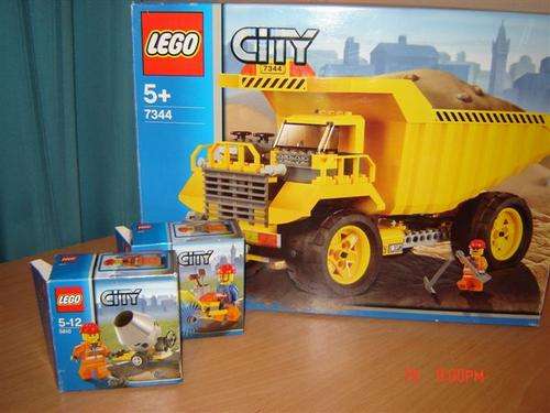 Lego dump truck plus two construction sets