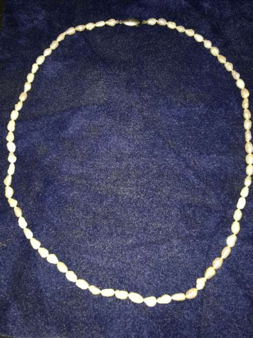 Vintage rice pearl necklace with silver clasp