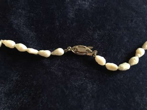 Vintage rice pearl necklace with silver clasp