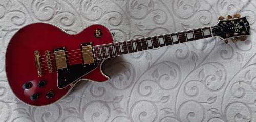 Tokai Les Paul Custom MIC in Translucent Red