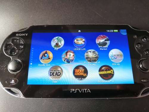 PS VITA WITH OVER 1000 GAMES SEE DESCRIPTION