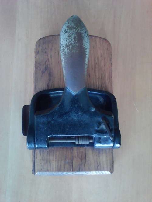 Vintage Punch Mounted In Solid Wood
