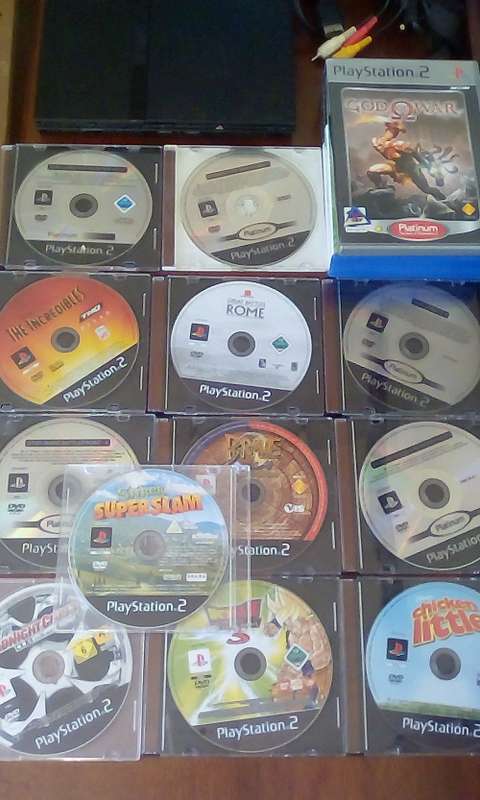 PlayStation 2 Console + Dance Mat + 1 Controller + Power Cable + RCA Cable + 16 Games