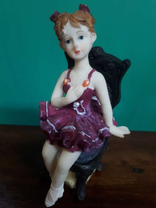 Stunning Handpainted Resin Figure of Young Girl on Chair