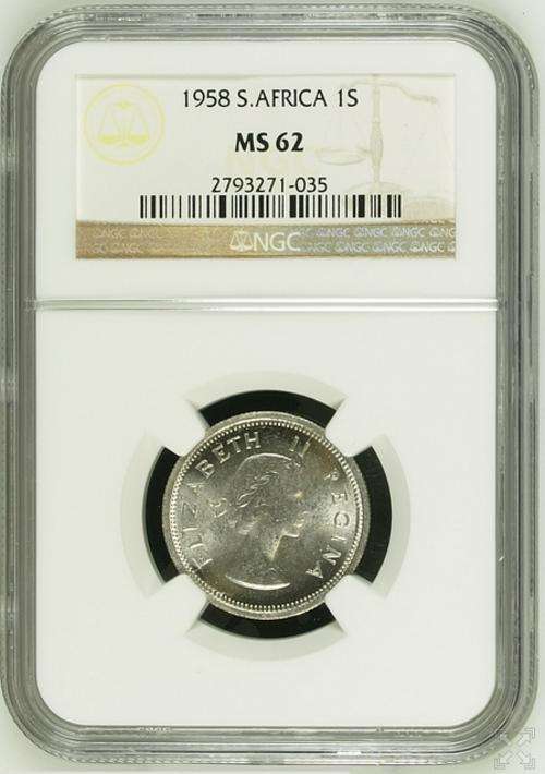 1958 1 Shilling graded MS62 by the NGC