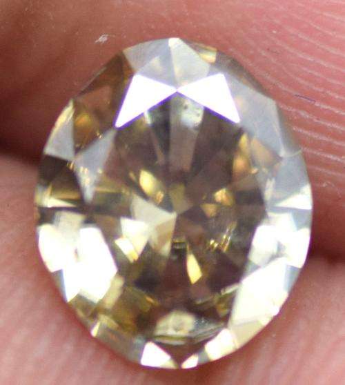 Incedible 0.81 ct 7.70 mm Fancy Brown Color Oval Cut Moissanite VVS1 NR
