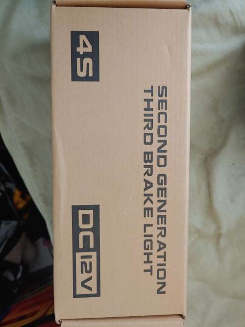 9 second generation third brake light. brand new. still sealed in box