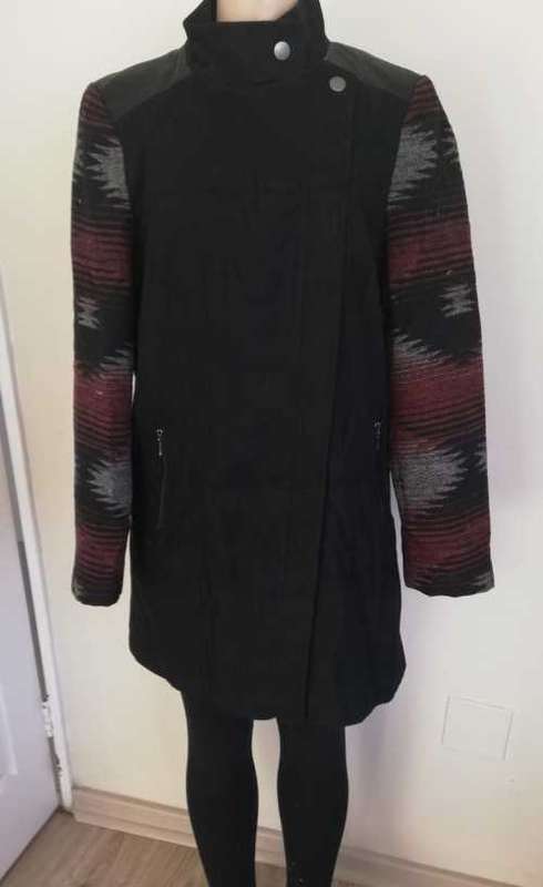 Classic black zip up coat with beautiful print sleeves