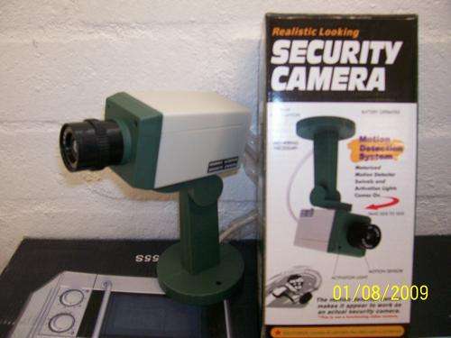 DUMMY  - SECURITY CAMERA - BATT.OPERATED  - camera really moves - LOOKS LIKE THE REAL THING