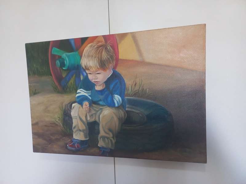 Original Painting of a Young Boy Day Dreaming Will Be Sitting On an Old Car Tyre.