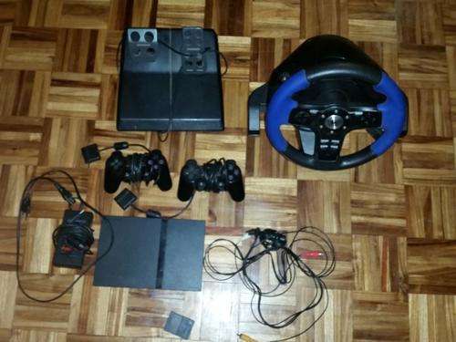 PS 2 slim with lots of extras and games