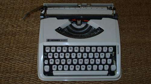 HERMES BABY TYPEWRITER WITH COVER