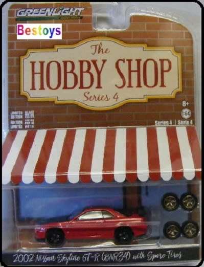 Greenlight Diecast Model Car Hobby Shop Nissan GT-R GTR R34 2002 + spare tyres 1/64 scale new in pac