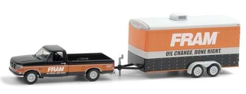 Greenlight Diecast Model Car Set Hitch and Tow Ford F 150 F150 XLT Pickup 1994 + Car Trailer `Fram`