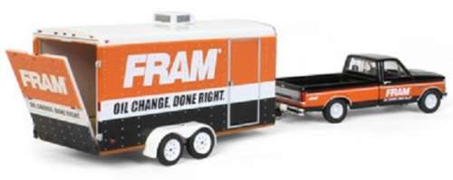 Greenlight Diecast Model Car Set Hitch and Tow Ford F 150 F150 XLT Pickup 1994 + Car Trailer `Fram`
