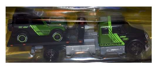 Maisto Elite Transport International Durastar Flatbed Truck + Ford Bronco Wildtrak 2021 `Toyo Tires`