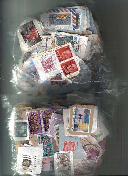 750 Stamps(approx) - on paper -1 lot Assortment A -More variety than B