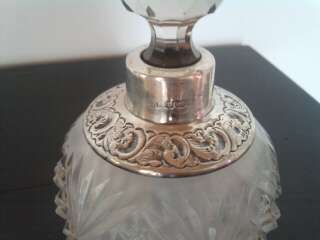 Crystal Perfume bottel with halmarked silver collar