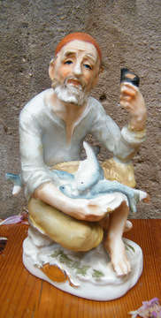 Man with basket of fish Figurine (14.5cm tall)