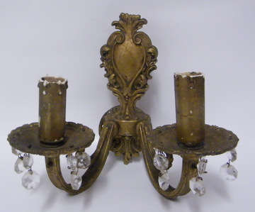 An early double wall brass light with glass dangles
