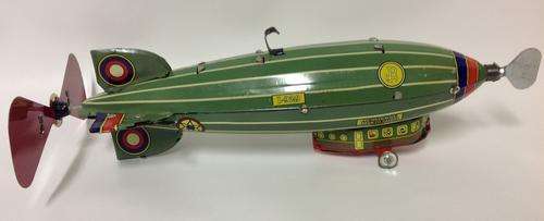 Vintage Tin Wind Up Flying Machine Toy