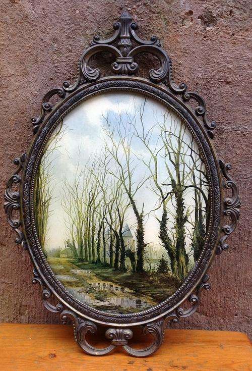 A very ornate Italian Made Oval Frame with Convex Glass and Picture of Trees and Manor - 43x30cm