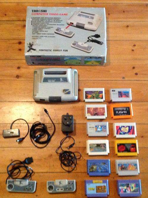 Tadashi Video Computer Game with 12 Games - Appears to be in good working condition...