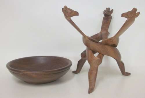 Interlocking carved stand with giraffe heads, supporting wooden bowl - 20cm tall