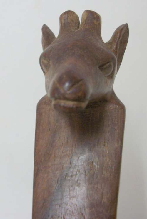 Interlocking carved stand with giraffe heads, supporting wooden bowl - 20cm tall
