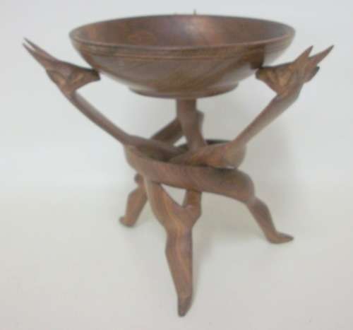 Beautifully Carved Stand with Buck Heads, supporting wooden bowl