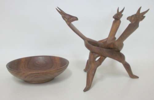 Beautifully Carved Stand with Buck Heads, supporting wooden bowl