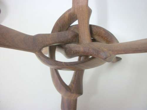 Beautifully Carved Stand with Buck Heads, supporting wooden bowl