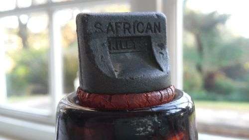 MID-YEAR SALE!!! 3 VINTAGE SAB CASTLE LAGER BEER BOTTLES WITH ORIGINAL LIDS ***VALUE R750.00***