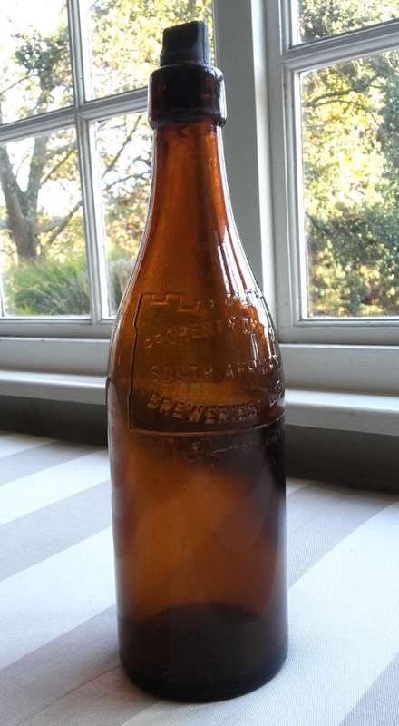 MID-YEAR SALE!!! 3 VINTAGE SAB CASTLE LAGER BEER BOTTLES WITH ORIGINAL LIDS ***VALUE R750.00***
