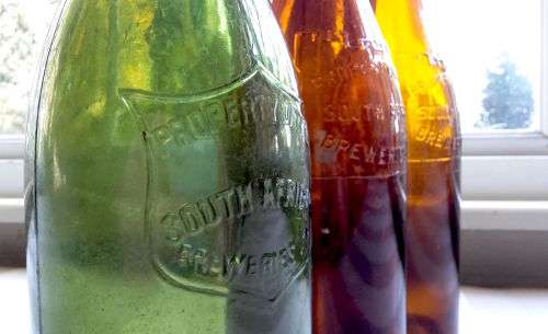 MID-YEAR SALE!!! 3 VINTAGE SAB CASTLE LAGER BEER BOTTLES WITH ORIGINAL LIDS ***VALUE R750.00***