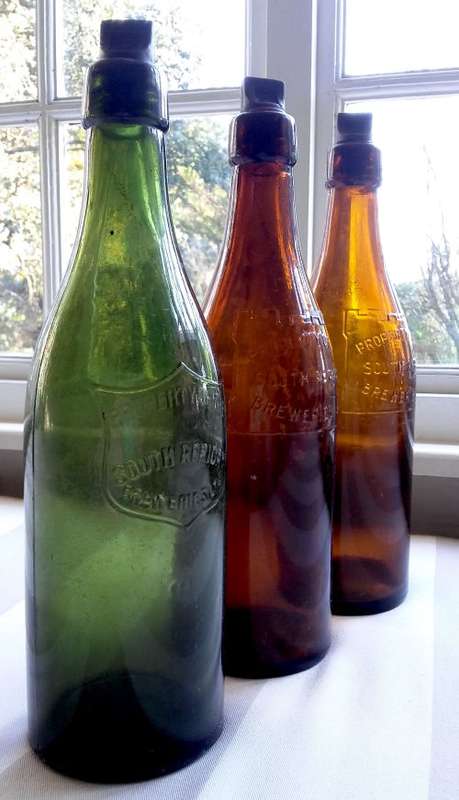 MID-YEAR SALE!!! 3 VINTAGE SAB CASTLE LAGER BEER BOTTLES WITH ORIGINAL LIDS ***VALUE R750.00***