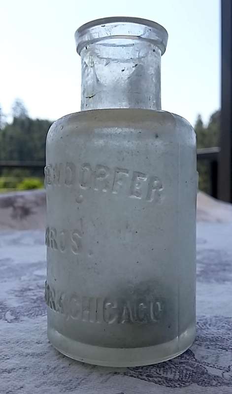 1890's Gerstendorfer Bros New York Chicago Embossed 'Japanese Gold Paint' Glass Bottle